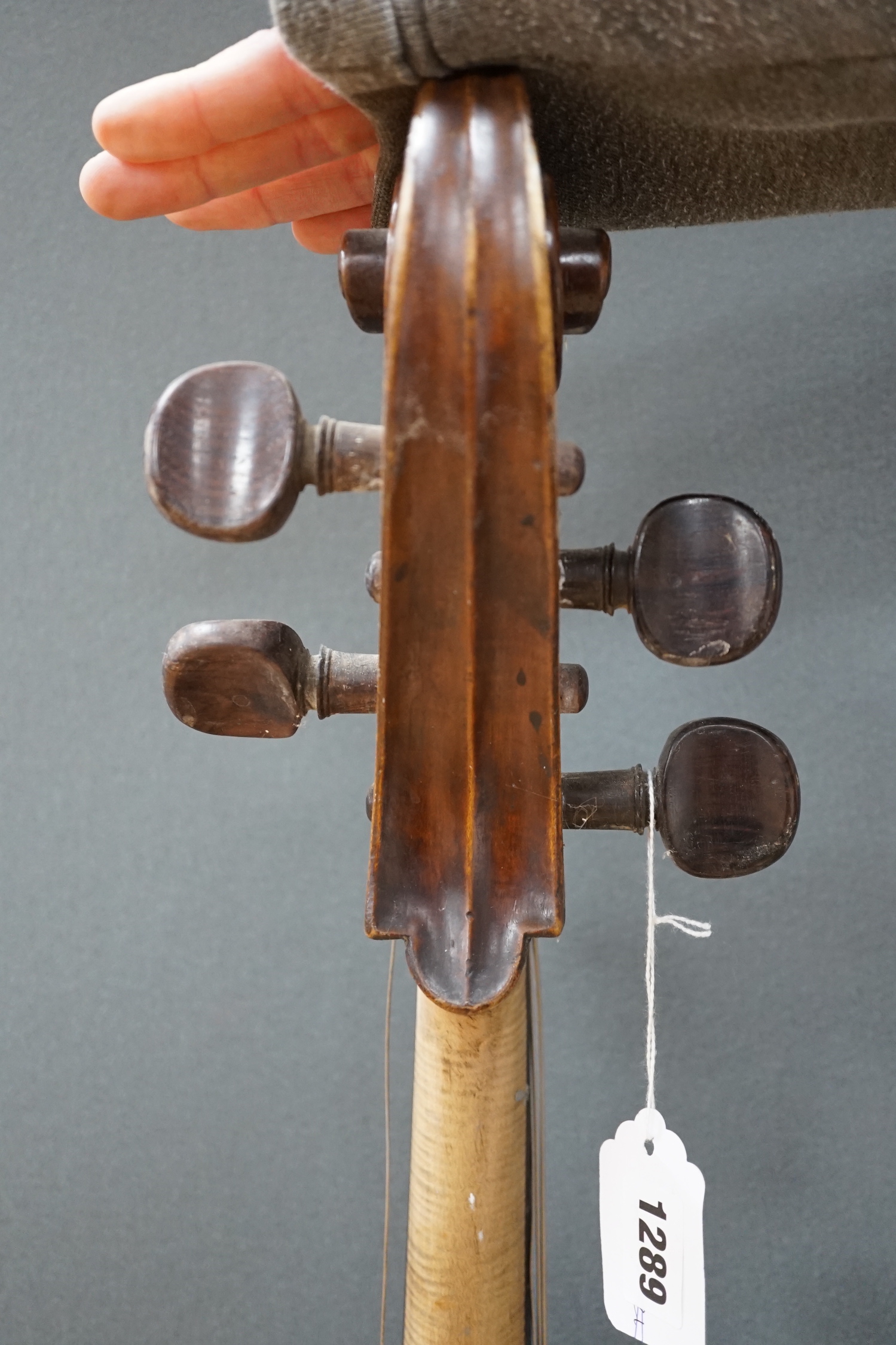 An early 20th century cello for restoration, indistinct internal label; ‘Restored by William J. Acton, Green Street, Forest Gate, London 1910’ length of body 72cm.